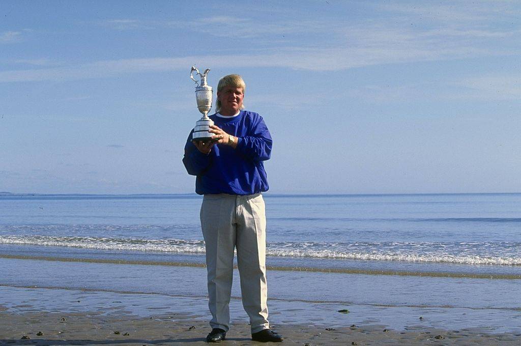 1995 Open Champion John Daly poses with the Claret Jug